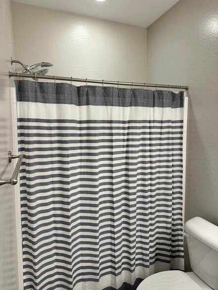 Bathroom with tub and shower - 6272 Barn Owl Ave