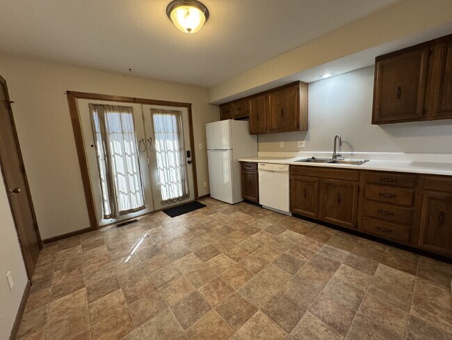 Building Photo - Up Where We Belong — Spacious 2-Story Townhome with Basement
