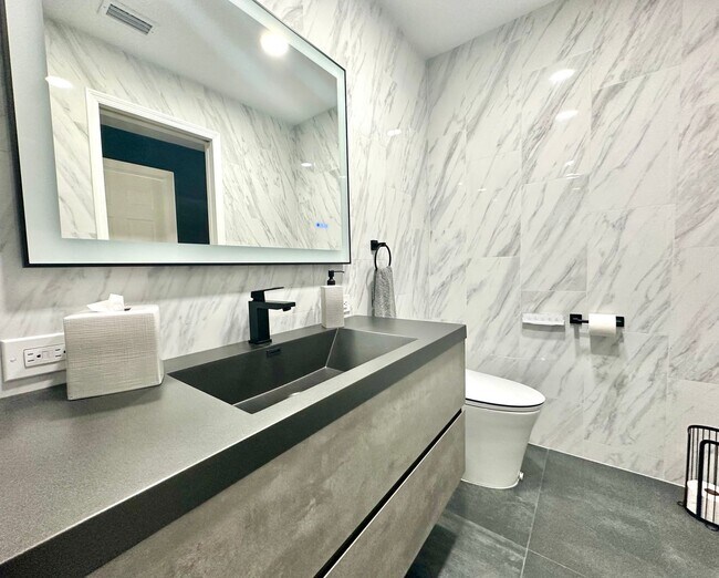 Building Photo - Bright, breezy & convenient: Your wew St. ...