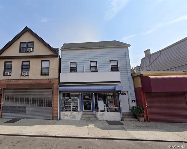 Building Photo - 18-19-19 College Point Blvd