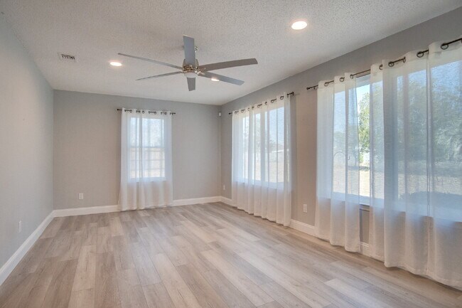 Building Photo - Lakefront 3BR/2BA Home on Orion Lake with Florida Room, Screened Patio, Hot Tub (As-Is), Solar Pa...