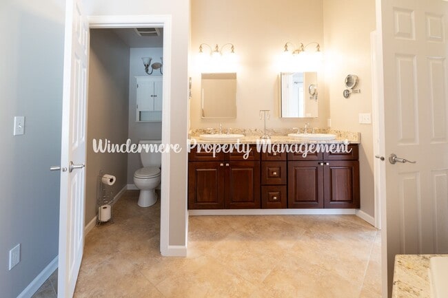 Building Photo - Beautifully Remodeled 2 bedroom in convenient location, private balcony, over sized garage, A/C a...