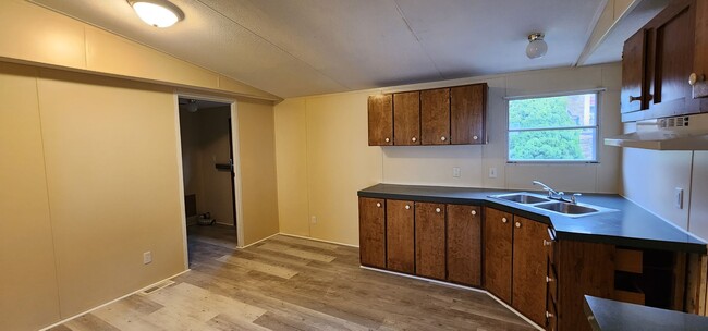 Building Photo - Available now, three bed two full bath sin...