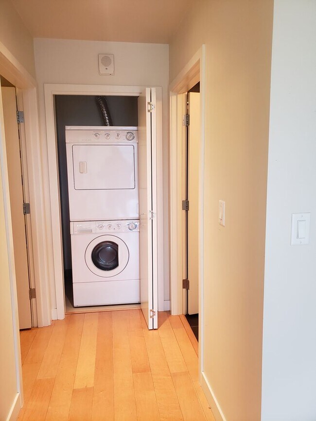 Building Photo - Wonderful Two story Penthouse Condo! Water...