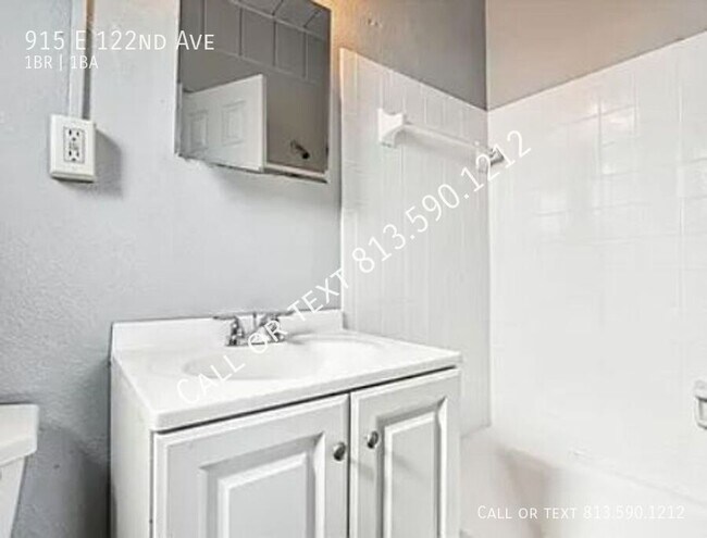 Building Photo - 915 E 122nd Ave