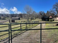 Building Photo - Completely Furnished - WITH FENCED CORRAL...