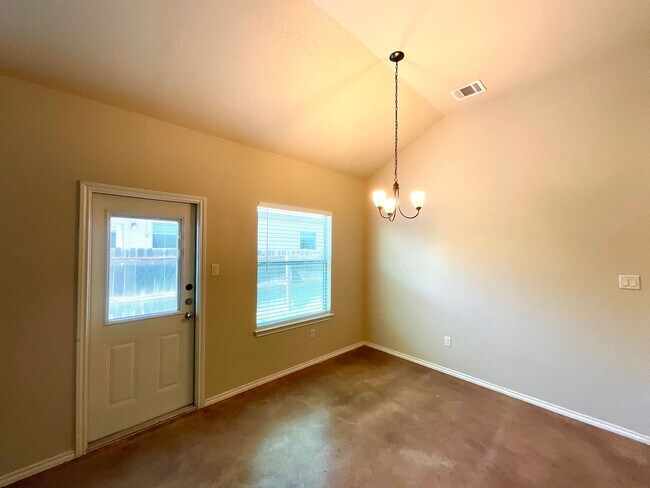 Building Photo - High Ceilings, Fenced Yard & 2-Car Garage – New Braunfels Living!