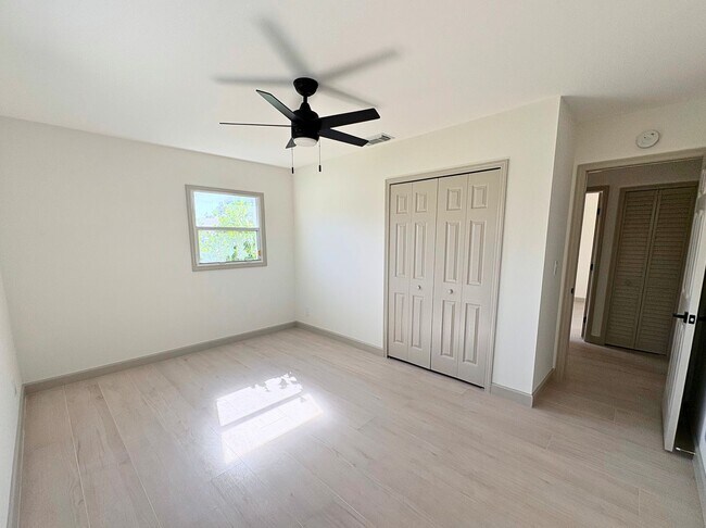 Building Photo - Fully Renovated 2BR Home with Designer Finishes & Fenced Yard