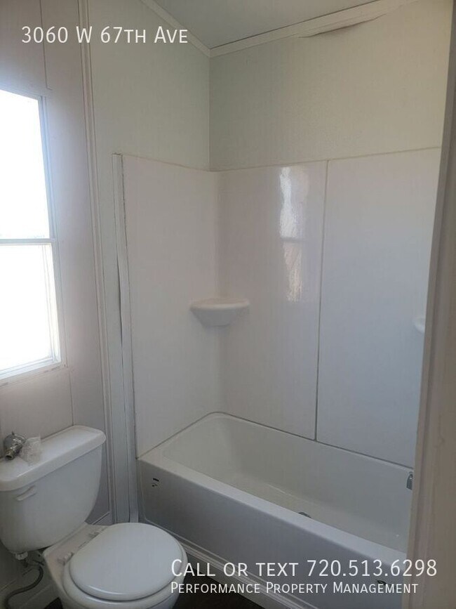 Building Photo - 3060 W 67th Ave