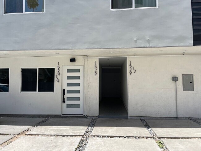 Building Photo - 1 Month Free!Brand New Thai Town Studio w/ All Utilities Included!