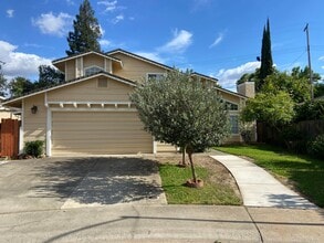 Building Photo - Gorgeous Home With Multiple Living Rooms, Two Primary Suites, Fruit Trees, And More!