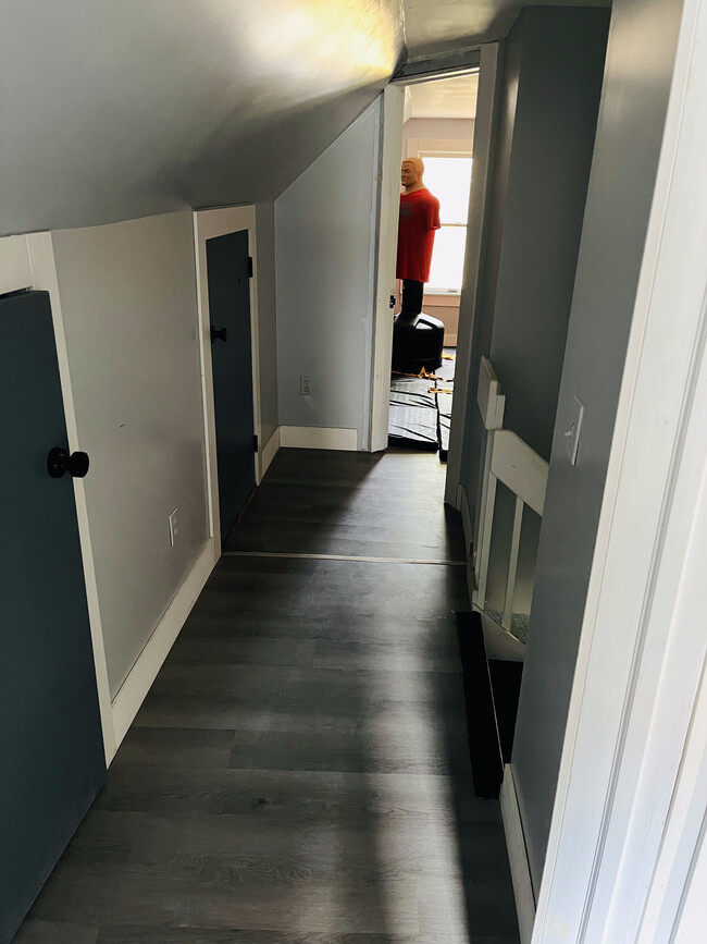 Upstairs hallway showing storage closets - 14 Mountain Ave