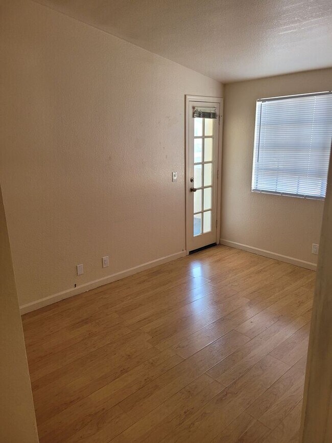 Building Photo - Second story 2/2 condo with easy access to I-10 and 60 FWY.