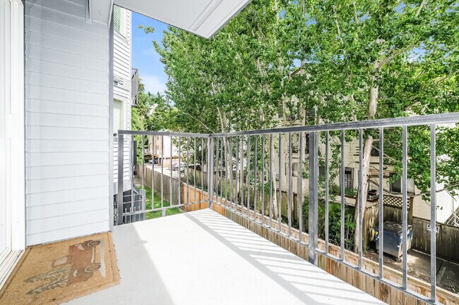 Building Photo - **Updated 2-Bedroom Condo with Secure Parking**
