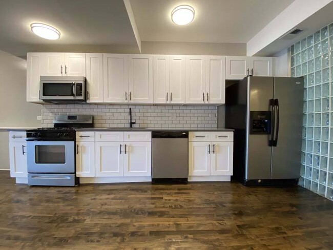 Large kitchen with hardwood floors - 2140 N Halsted