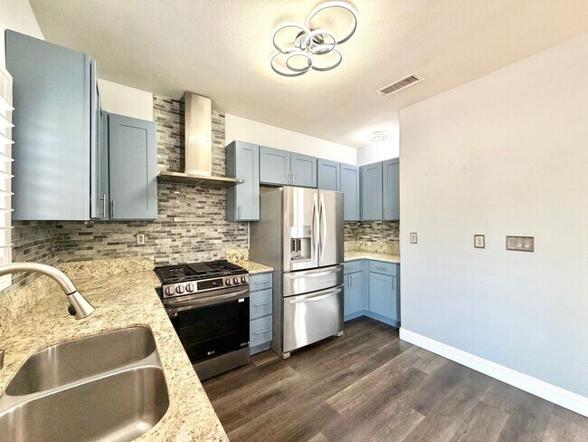 Building Photo - Beautifully Renovated 4 Bedroom Home with INCLUDED Solar, Large Backyard & Gazebo