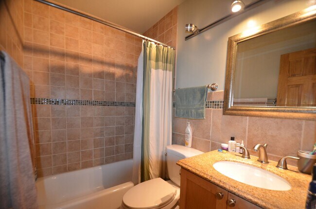 Building Photo - Pets Negotiable!  Walk to town, community hot tub! 2 month lease!