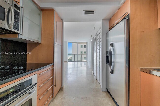 Building Photo - 6365 Collins Ave