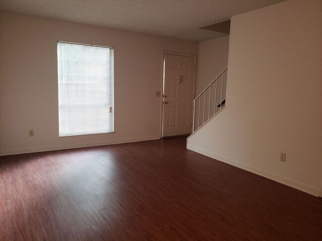 Primary Photo - 1 Bedroom, 1.5 Bath Townhouse