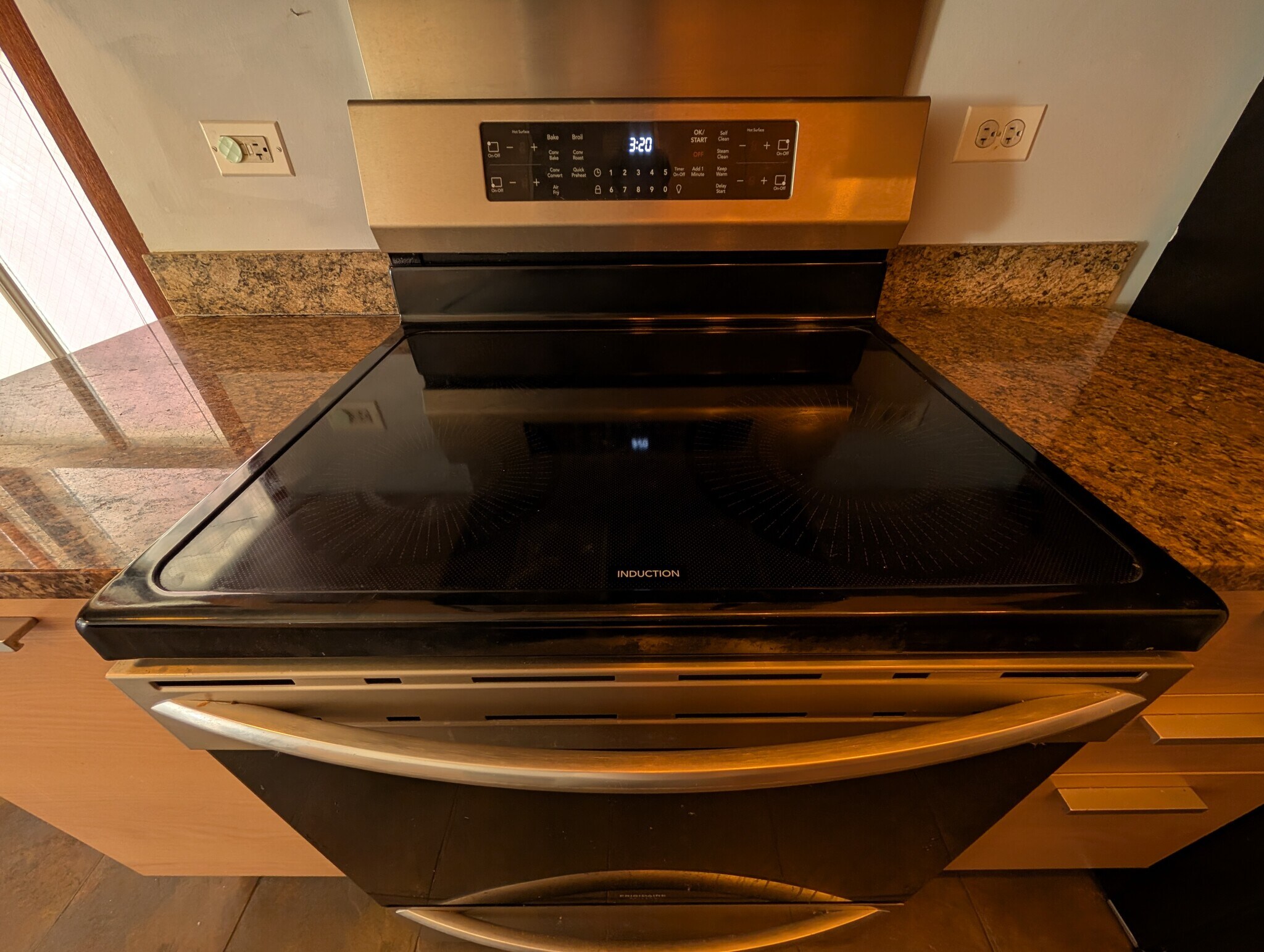 2022 induction stove installation - 5400 S Harper Ave