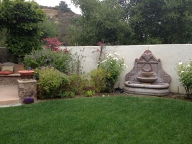 Building Photo - Former Model Home in Gated Carmel Valley Community with Spa & Outdoor Kitchen