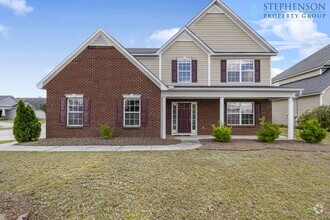 Building Photo - Freshly Remodeled 5 Bedroom with Primary B...