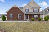 Building Photo - Freshly Remodeled 5 Bedroom with Primary B...