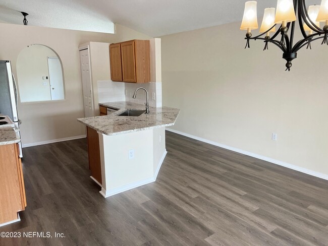 Building Photo - 6580 Gentle Oaks Dr N