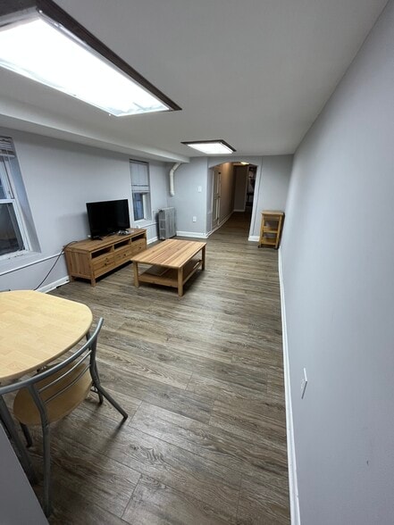 Lower Level Livingroom - 118 S Washington St