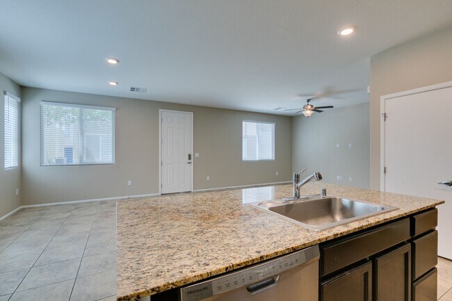 Building Photo - Spacious Townhouse with Loft & Rare 3-Car Garage!