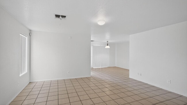 Building Photo - 7395 W San Miguel Ave