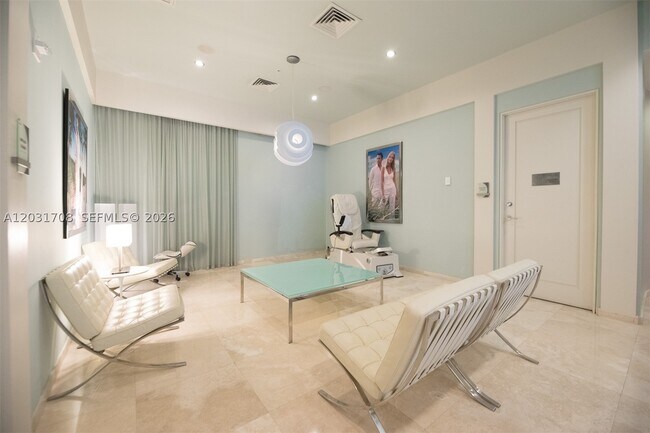 Building Photo - 10275 Collins Ave