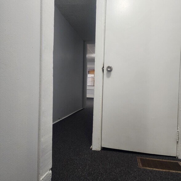 Hallway between kitchen and front bedroom, another walk-in closet in hall - 396 Norton St