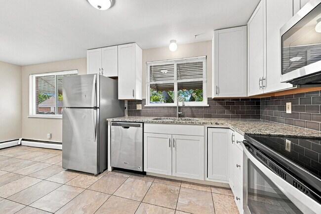 Building Photo - PRICE REDUCED!!  BEST PRICE IN THE AREA FOR 4+BEDROOM  Spacious 4-Bedroom Wheat Ridge Home with F...