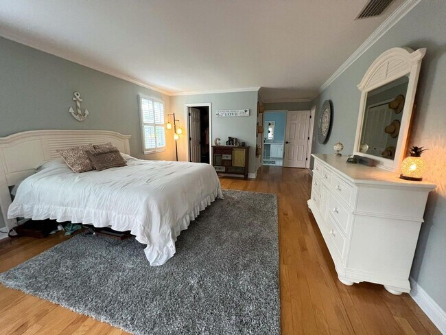 Building Photo - Palm City Home with Dock and Lift