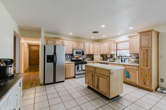 Building Photo - Spacious 3 Bedroom Home with Solar Panels and a Pool