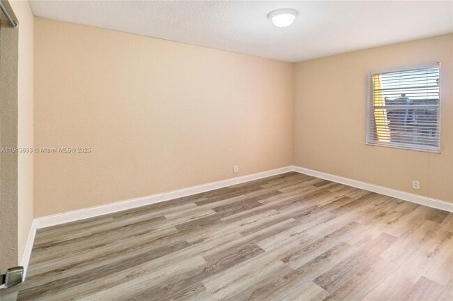 Building Photo - 5975 NW 25th Ct