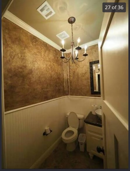 restroom near kitchen and living room - 4413 Spyglass Dr