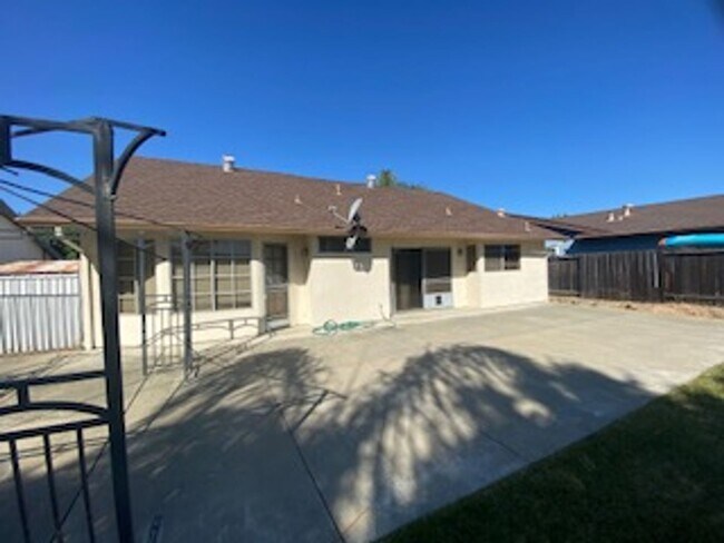 Building Photo - Huge semi-private Backyard with Large Patio!