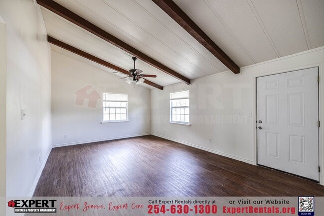 Building Photo - A cozy 3-bedroom, 2-bathroom home nestled on a corner lot