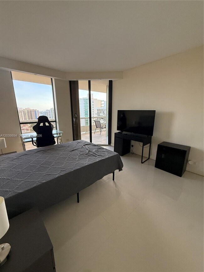 Building Photo - 20191 E Country Club Dr