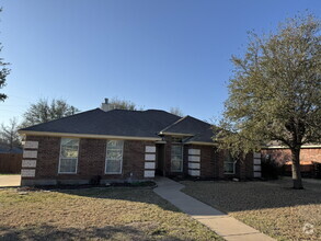 Building Photo - Lovely, brick 3 bedroom 2 bath on a corner...