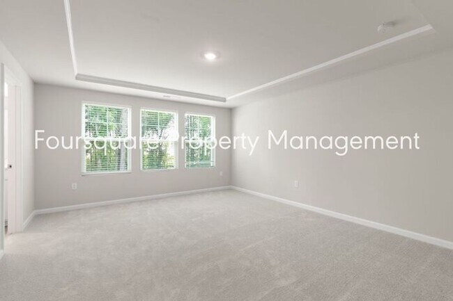 Building Photo - Coming Soon; July 27, 2026 : End unit ToSpacious End-Unit Townhome with 2nd Floor Loft, Screened-...