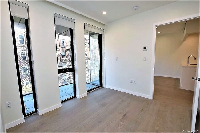 Building Photo - 41-26-41-44 44th St