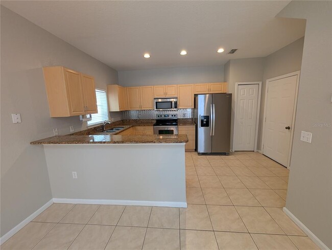 Building Photo - 6212 Ashbury Palms Dr