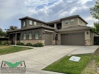 Building Photo - Executive Home in Gated Community Wildwings