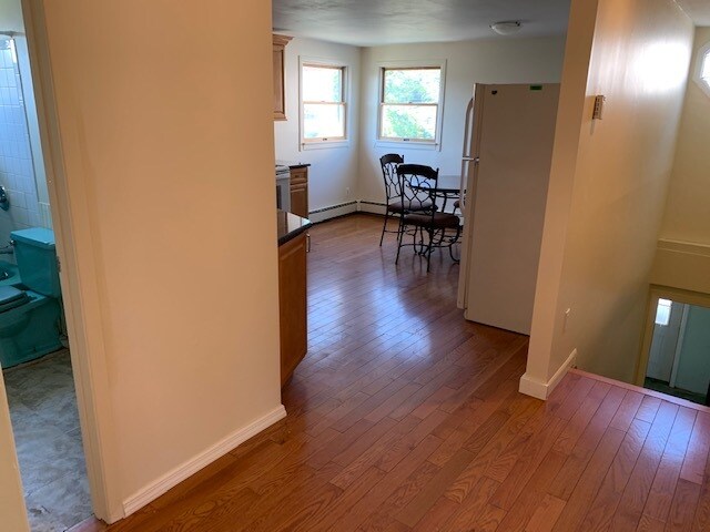 Hall looking toward kitchen and stairs - 118 Brighton Way