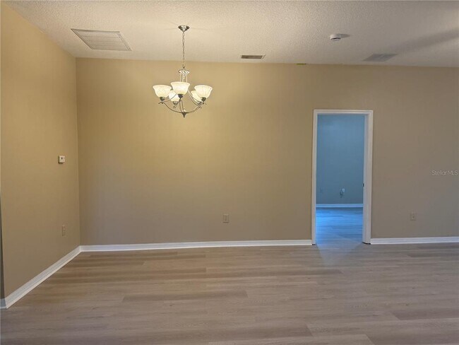 Building Photo - 8210 Whistling Pine Way