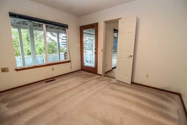 Building Photo - Spacious 4-Bedroom Home with Stunning Lake...