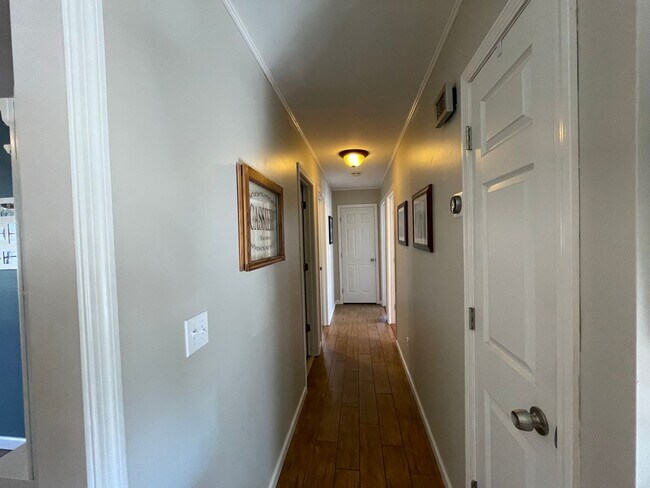 Building Photo - Fall in love with this 4 bedroom/ 2 bathroom single family home!
